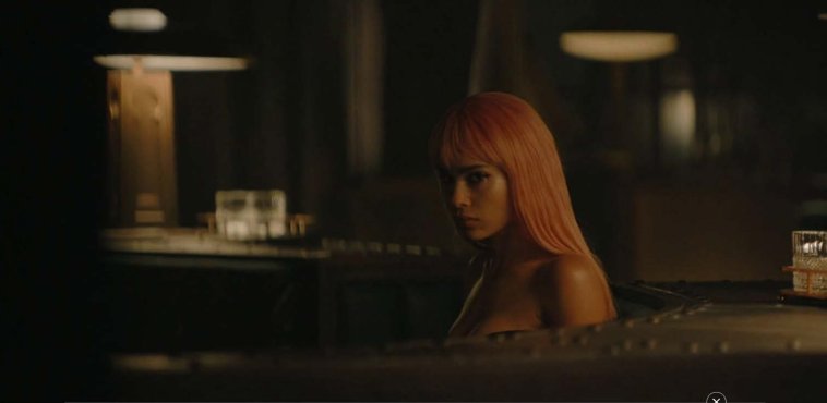 Zoe Kravitz-4-cleavage baring-long pink wig-crpd.JPG